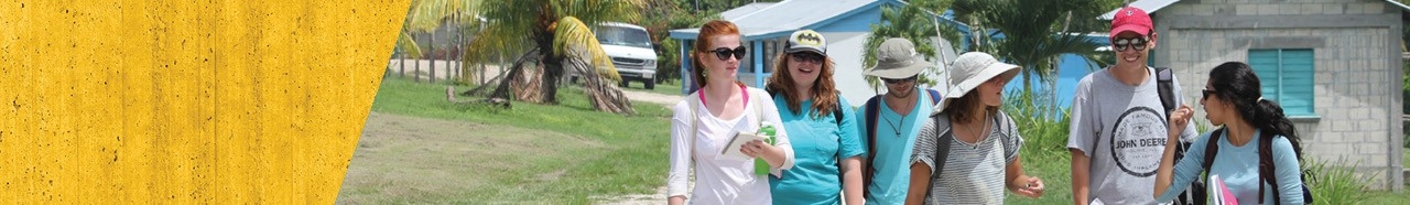 Group of anthropology students traveling outdoors.